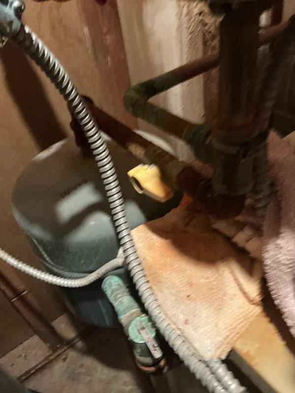 Responded to emergency no-heat call on 6-9 year old furnace system. Installed previously ordered replacement part to restore heating functionality. Upon inspection, identified and addressed corroded plumbing connections and pump assembly components showing significant oxidation and deterioration. Completed repairs, tested system operation, and verified proper heating output restored to residence.