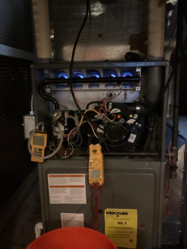Completed comprehensive heating maintenance on gas furnace system. Performed diagnostic testing using digital meters to verify proper electrical operation, inspected burner assembly with all five burners igniting properly with blue flames, and conducted internal camera inspection of ductwork to assess interior condition and ensure clear airflow pathways.