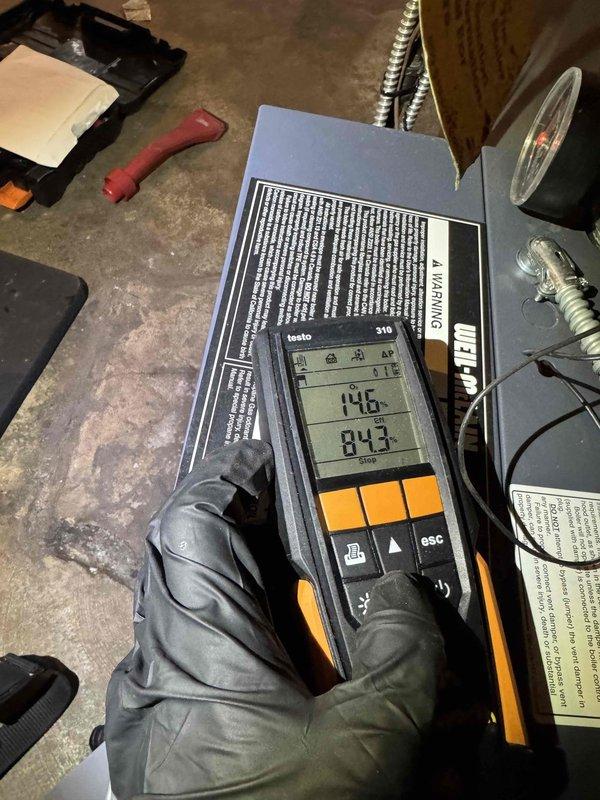 Completed scheduled boiler maintenance inspection and diagnostics. Performed combustion analysis using digital testing equipment, recording temperature and efficiency readings to verify proper operation and safe combustion levels. All systems tested within normal operating parameters.