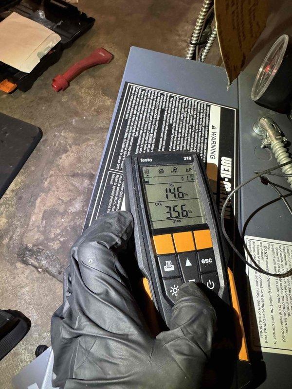 Completed scheduled boiler maintenance inspection and diagnostics. Performed combustion analysis using digital testing equipment, recording temperature and efficiency readings to verify proper operation and safe combustion levels. All systems tested within normal operating parameters.