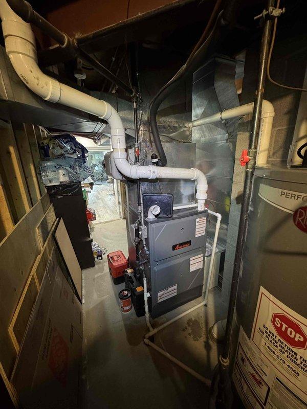 Completed first-year heating maintenance on Amana furnace unit as part of annual service plan. Performed comprehensive system inspection including burner assembly, heat exchanger, blower motor, and all safety controls. Verified proper operation of gas valve, ignition system, and flame sensor. Checked and cleaned condensate drain lines, inspected venting system for proper clearances and secure connections, and tested thermostat functionality. All components found operating within manufacturer specifications with no deficiencies noted.