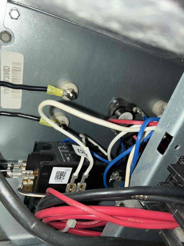 Completed comprehensive heating maintenance on two HVAC systems, performing thorough inspection of all electrical components, contactors, relays, and wiring connections within both air handler units. All blower motor assemblies, control panels, circuit breakers, and safety devices were examined and found to be operating within normal parameters, with documentation photos captured for service records.