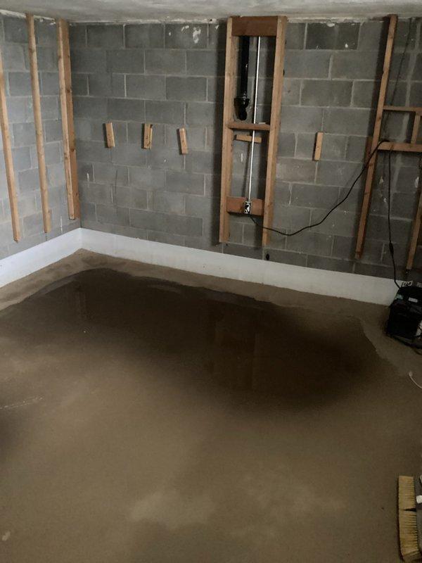 Responded to no hot water complaint at residential property. Upon arrival, inspected tanked water heater system in unfinished basement area. Completed diagnostic assessment and documented existing conditions of installation location and surrounding mechanical space for service records.