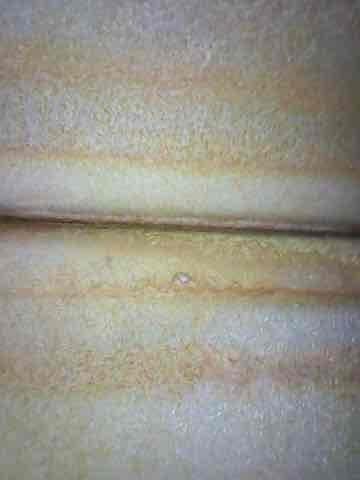 Completed comprehensive heating system maintenance on unit over 10 years old. Inspected ductwork in crawl space area, noting visible rust staining and oxidation on metal supply ducts indicating age and moisture exposure typical of older HVAC installations. Performed standard maintenance protocol including system inspection, filter check, and operational verification to ensure proper heating function for continued reliable operation.