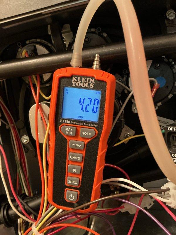 Responded to emergency no heat call on recently installed Amana gas furnace system that was not heating above 67 degrees. Performed diagnostic testing using differential manometer to measure gas pressure and airflow readings within the system. Upon inspection, identified issue preventing proper heating operation on unit less than 5 years old. Conducted pressure testing at multiple points in the system, obtaining readings of 4.70 and 12.0 inches of water column to verify gas valve and manifold pressure specifications. Verified all electrical connections, safety controls, and limit switches were functioning properly. Confirmed warranty status on equipment prior to completing repairs, restoring full heating functionality to the system.