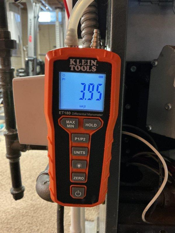 Completed heating maintenance on two HVAC systems in mechanical room. Performed diagnostic pressure testing using differential manometer, recording static pressure measurements to verify proper airflow and system performance. Inspected air handler units, copper refrigerant lines, and associated mechanical components to ensure all equipment operating within manufacturer specifications.