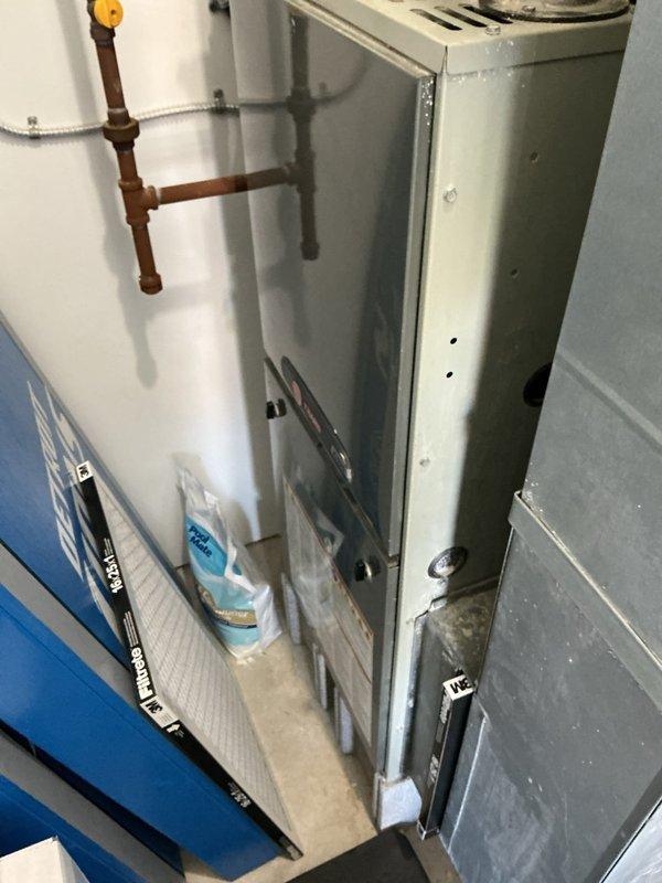 Completed heating maintenance on two HVAC systems in mechanical room. Performed diagnostic pressure testing using differential manometer, recording static pressure measurements to verify proper airflow and system performance. Inspected air handler units, copper refrigerant lines, and associated mechanical components to ensure all equipment operating within manufacturer specifications.