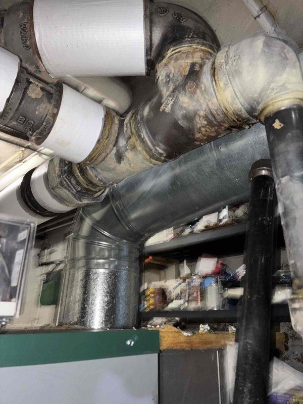 Completed first-year preventive maintenance on steam boiler system, including comprehensive inspection of all major components, ductwork, and piping connections. Documented existing conditions of insulated steam lines, exhaust ductwork, and distribution piping, noting age-related discoloration on PVC condensate lines and connections. All equipment found operational with no immediate repairs required at this time.