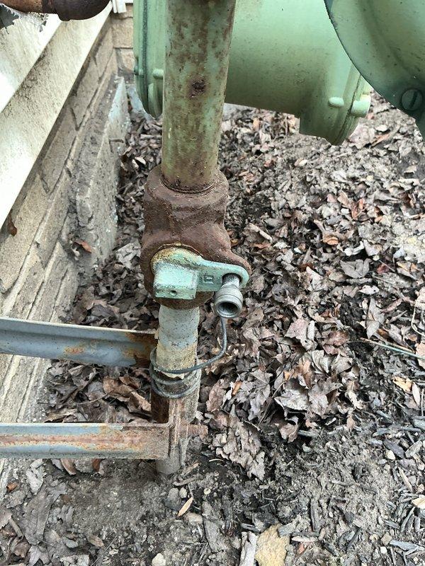 Responded to no heat call on residential furnace system. Upon arrival, customer reported unit would not activate. Conducted diagnostic inspection of heating system and exterior components. Documented existing conditions of outdoor equipment and connections showing signs of weathering and corrosion on external utility fixtures. Assessed system operation and identified cause of heating failure. Performed necessary repairs to restore heat to residence. Unit tested and confirmed operational before departure.