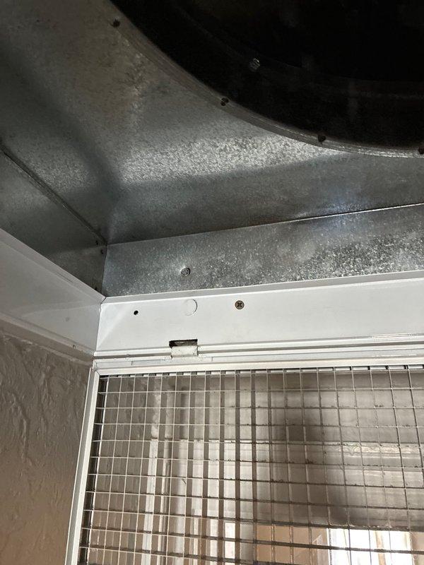Completed estimate for replacement of ice-damaged AC condenser on Unico high-velocity air conditioning system. Assessed exterior condensing unit damage and documented interior ductwork conditions, noting condensation present on galvanized metal ducts and filter assembly. Provided replacement options for the damaged outdoor unit while confirming interior system components remain operational.