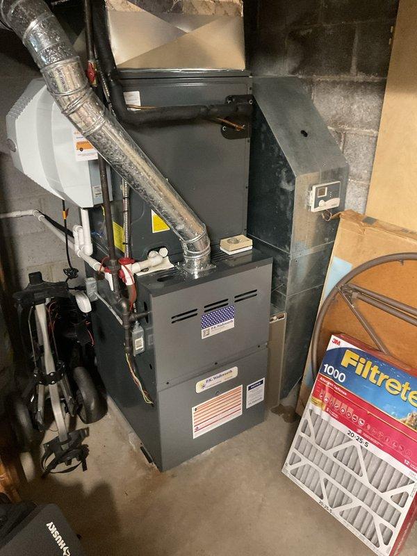 Completed comprehensive heating maintenance on residential gas furnace system located in basement utility area. Performed standard seasonal inspection including filter replacement with new Filtrete 1000 MPR media filter (20x25x5), verified proper operation of gas valve controls, inspected ductwork connections and seals, and confirmed all safety labels and manufacturer specifications were clearly visible and intact. System tested and returned to normal operating condition with no deficiencies noted.