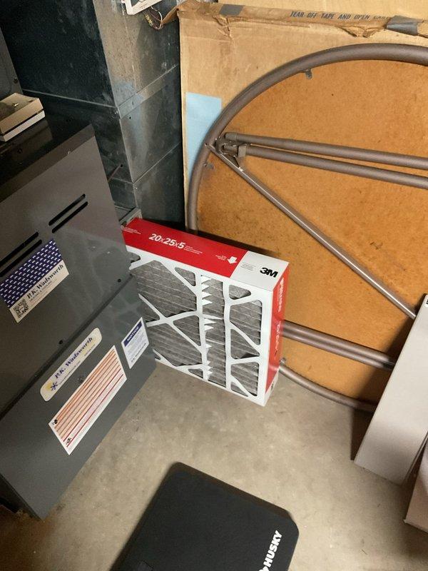 Completed comprehensive heating maintenance on residential gas furnace system located in basement utility area. Performed standard seasonal inspection including filter replacement with new Filtrete 1000 MPR media filter (20x25x5), verified proper operation of gas valve controls, inspected ductwork connections and seals, and confirmed all safety labels and manufacturer specifications were clearly visible and intact. System tested and returned to normal operating condition with no deficiencies noted.