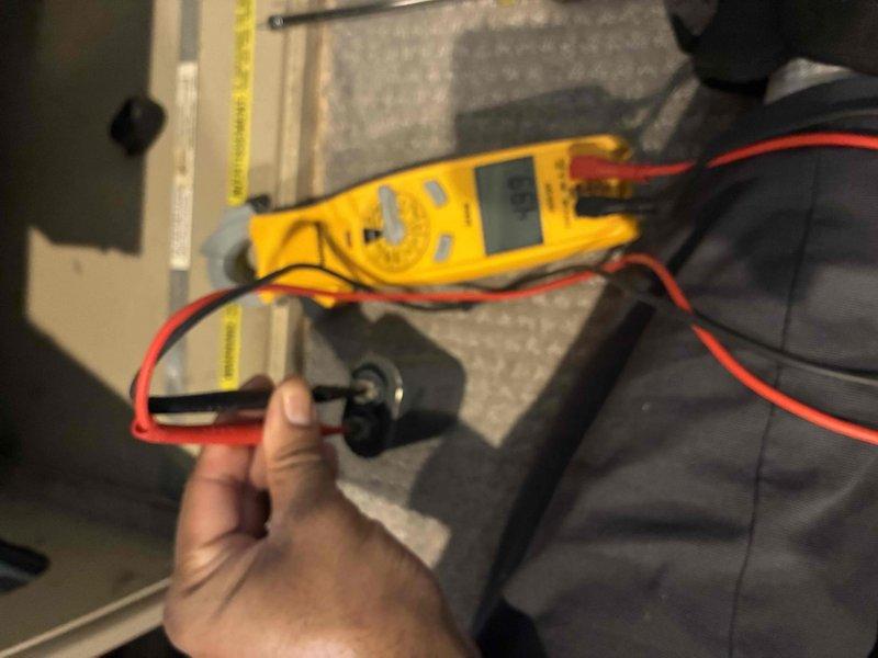 Completed first-year heating maintenance on two HVAC systems, performing comprehensive tune-ups including inspection of all major components, electrical connections, and safety controls. Investigated reported humidifier leak concern at upstairs furnace location; confirmed humidifier was in off position and assessed potential moisture source affecting ceiling below. Tested capacitor functionality using digital multimeter to verify proper electrical performance and inspected heating elements, gas valve assembly, and flame sensor for optimal operation.