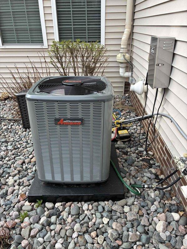 Completed comprehensive cooling maintenance on Amana outdoor condensing unit. Performed standard preventive maintenance procedures including system diagnostics with digital manifold gauges to verify refrigerant pressures and temperatures. Inspected condenser coil, fan operation, and electrical connections. All refrigerant lines and service ports were accessed for testing. Unit is operating within manufacturer specifications with proper airflow through the condenser coil and fan assembly. System tested and left in normal operating condition.