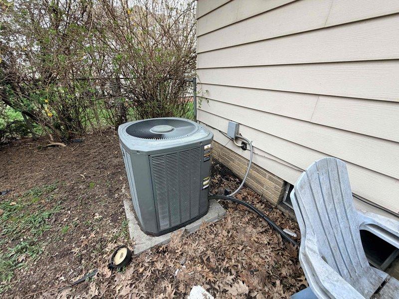 Responded to no cooling complaint on aging Trane residential air conditioning system. Upon arrival, confirmed unit was running but delivering warm air to living space. Performed diagnostic evaluation of outdoor condensing unit and determined system required further technical assessment to identify root cause of cooling failure and restore proper operation.