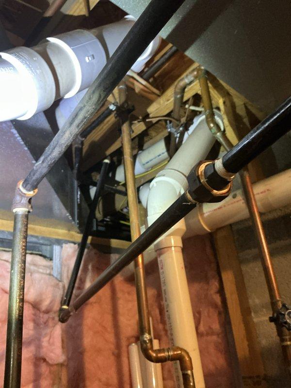 Conducted comprehensive afternoon electrical inspection of residential property. Examined and documented mechanical space infrastructure including electrical routing through floor joists alongside plumbing systems, and verified proper installation and functionality of bathroom GFCI outlet with connected device. All electrical components inspected met current code requirements and operational standards.