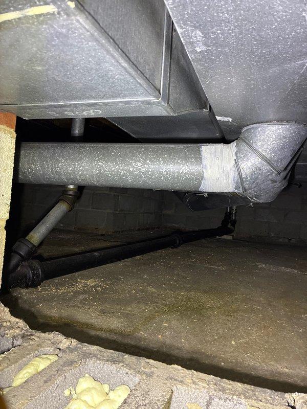 Conducted comprehensive assessment of existing forced air HVAC system to provide replacement options for residential property. Evaluated outdoor condenser unit showing significant age-related wear and weathering, along with interior ductwork configuration in confined space installation. Documented current system specifications including accessible attic-mounted air handler with insulated refrigerant lines and flexible duct connections to present customer with appropriate equipment upgrade recommendations based on existing infrastructure and access conditions.