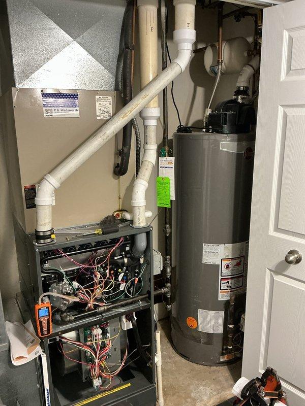 Completed routine heating maintenance on Lennox heat pump system, model G33-360-2F. Performed comprehensive inspection of indoor air handler unit, verified proper operation of all electrical components and connections, checked refrigerant evaporator section, and inspected associated PVC condensate drainage system for proper flow and positioning. All equipment found operating within manufacturer specifications with no deficiencies noted.