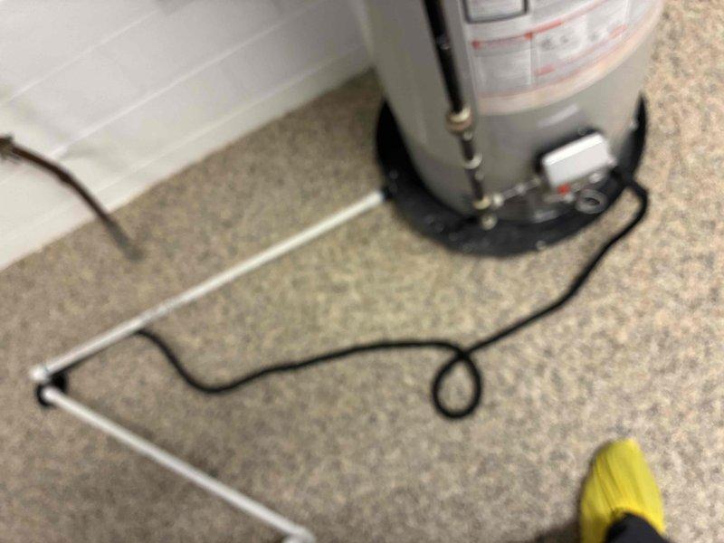 Performed routine maintenance flush on residential tanked water heater. Drained sediment buildup from tank bottom through drain valve, cleared accumulated mineral deposits, and refilled system to restore optimal heating efficiency and extend equipment lifespan. Verified proper operation of pressure relief valve and confirmed all plumbing connections were secure upon completion.
