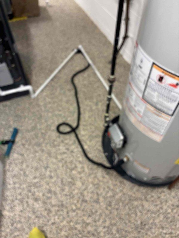Performed routine maintenance flush on residential tanked water heater. Drained sediment buildup from tank bottom through drain valve, cleared accumulated mineral deposits, and refilled system to restore optimal heating efficiency and extend equipment lifespan. Verified proper operation of pressure relief valve and confirmed all plumbing connections were secure upon completion.