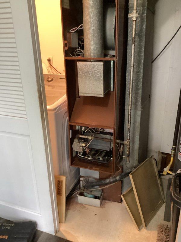 Responded to service call for furnace producing abnormal noise during operation. Upon inspection, found significant dust and debris accumulation throughout the unit and ductwork, consistent with years of deferred maintenance. Performed comprehensive cleaning of furnace cabinet, blower assembly, and accessible ductwork sections. Removed deteriorated insulation material from vent opening and cleared accumulated particulate matter from all mechanical components. Verified proper airflow and system operation following cleaning. Unit operating normally with noise issue resolved. Recommended establishing regular maintenance schedule to prevent future buildup and ensure optimal system performance.