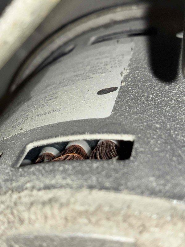 Responded to service call for furnace producing abnormal noise during operation. Upon inspection, found significant dust and debris accumulation throughout the unit and ductwork, consistent with years of deferred maintenance. Performed comprehensive cleaning of furnace cabinet, blower assembly, and accessible ductwork sections. Removed deteriorated insulation material from vent opening and cleared accumulated particulate matter from all mechanical components. Verified proper airflow and system operation following cleaning. Unit operating normally with noise issue resolved. Recommended establishing regular maintenance schedule to prevent future buildup and ensure optimal system performance.