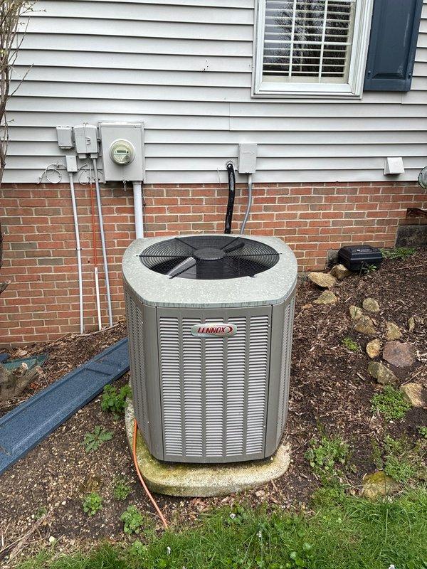 Conducted comprehensive HVAC system evaluation for furnace replacement estimate. Inspection revealed heat exchanger displaying visible deterioration and signs of potential failure, necessitating equipment replacement options discussion. Documented existing Lennox outdoor air conditioning unit positioned on concrete pad with proper clearances and electrical service connections. Assessed indoor furnace installation in basement utility area, noting current configuration with water heater and existing ductwork routing through floor joists. Photographed equipment conditions and installation locations to support replacement proposal. Provided customer with multiple furnace replacement options based on system requirements and heat exchanger condition findings.