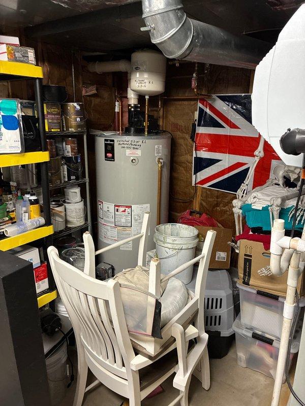 Conducted comprehensive HVAC system evaluation for furnace replacement estimate. Inspection revealed heat exchanger displaying visible deterioration and signs of potential failure, necessitating equipment replacement options discussion. Documented existing Lennox outdoor air conditioning unit positioned on concrete pad with proper clearances and electrical service connections. Assessed indoor furnace installation in basement utility area, noting current configuration with water heater and existing ductwork routing through floor joists. Photographed equipment conditions and installation locations to support replacement proposal. Provided customer with multiple furnace replacement options based on system requirements and heat exchanger condition findings.
