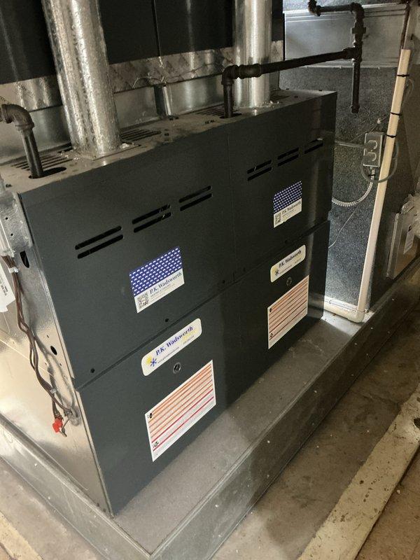 Performed comprehensive maintenance on two heating systems located in mechanical room. Inspected both HVAC units, verified proper operation of all components, checked ductwork connections, and confirmed all safety labels and specifications were intact. Systems found to be in good working condition with no issues identified.