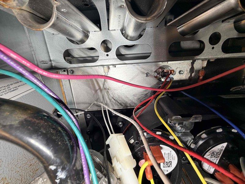 Completed comprehensive heating maintenance on residential furnace system. Performed thorough inspection of heat exchanger assembly, verifying structural integrity and checking for signs of cracks or deterioration. Examined all electrical connections including wire harnesses, relays, and contactors to ensure proper termination and secure mounting. Inspected blower motor assembly and squirrel cage blower wheel, confirming proper operation and checking for debris accumulation. Verified all safety controls and limit switches are functioning within manufacturer specifications. All components found to be in good working order with normal operational wear patterns observed.