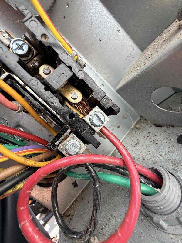 Completed comprehensive HVAC tune-up service on residential unit. Customer reported increased runtime following previous service work from October. Performed standard maintenance protocol including inspection of electrical connections at terminal block, verified proper wire terminations and tightness of all connection screws, and examined capacitor for proper operation and secure mounting. All electrical components, including capacitor (CBB65B 440VAC rated), wiring harnesses, and control board connections were inspected and found to be functioning within normal parameters with no immediate concerns identified.