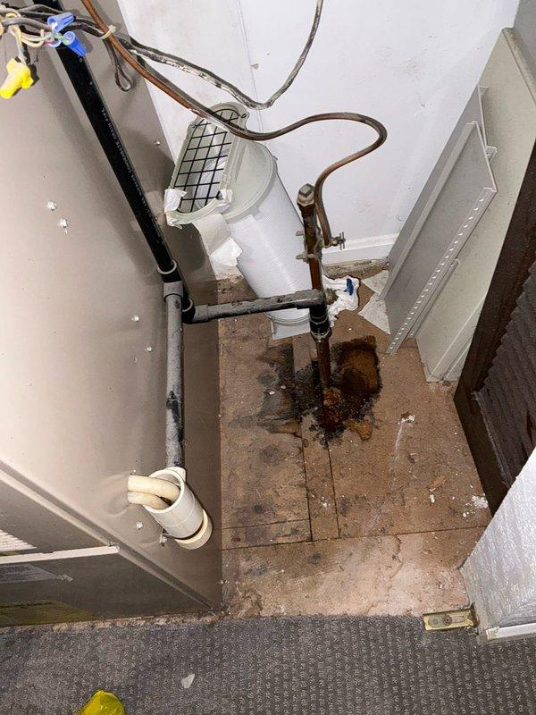 Conducted upstairs HVAC system evaluation and provided replacement estimate for existing furnace with options to add air conditioning capability. Documented existing mechanical closet conditions, including water-damaged flooring, aging copper piping, and current furnace installation with spatial measurements for equipment replacement planning. Prepared dimensional diagrams showing clearances and equipment positioning requirements for proposed furnace and AC system installation in confined upstairs utility space.