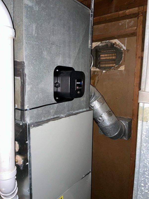 Diagnosed furnace with cracked heat exchanger and provided replacement options to customer. Documented existing HVAC system installation including furnace unit, ductwork connections, venting configuration, and electrical components for estimate preparation.