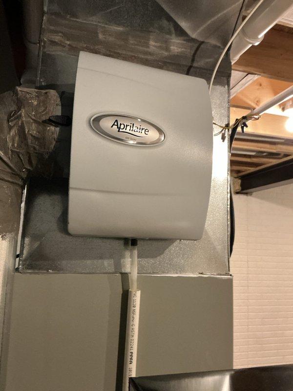 Completed routine cooling system maintenance inspection on residential HVAC system. Performed comprehensive evaluation of ductwork system, including main supply plenum, branch ducts, and flexible duct connections. Inspected Aprilaire humidifier unit mounted to supply ductwork, confirming proper installation and operational condition. Verified all duct connections, seals, and transitions for proper airflow and system efficiency. System found to be in normal operating condition with all components functioning as designed.