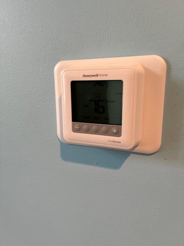 Completed full HVAC system installation including 80% efficiency furnace, air conditioning unit, and return drop. Verified system operation with digital manometer readings showing proper static pressure at 3.01" and temperature differential of 34.9°F. Installed and programmed Honeywell Home ProSeries thermostat for optimal climate control. All equipment tested and confirmed operational to manufacturer specifications.