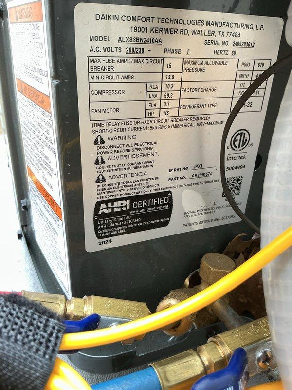 Completed follow-up system start-up and refrigerant charge verification on newly installed Amana ALXS36DN2410AA air conditioning condenser unit with R-32 refrigerant. Performed operational checks, confirmed electrical specifications at 208/230V single phase with proper circuit protection, and verified system performance as warmer ambient temperatures allowed for accurate refrigerant level assessment as previously scheduled with customer during initial installation.