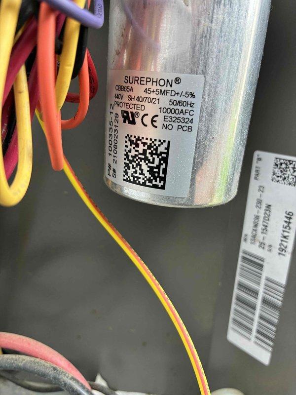 Completed scheduled preventive maintenance on residential air conditioning system. Performed comprehensive inspection of outdoor condensing unit, including visual examination of dual-run capacitor (CBB65A, 440V, 45+5 MFD) which showed proper specifications and secure electrical connections. Measured and recorded operating amperage at 0.45A and ambient temperature at 82.5°F using calibrated clamp meter. All electrical components, wiring connections, and capacitor functionality verified within normal operating parameters. System operating efficiently with no deficiencies noted.