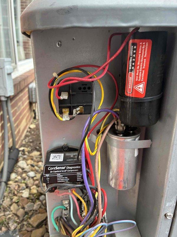 Completed comprehensive cooling maintenance on two HVAC systems. Replaced air filter as needed and performed thorough inspection of humidifier system. Conducted electrical diagnostics using clamp meter to verify proper amperage draw and system performance. Inspected outdoor condensing unit electrical components including capacitor, contactor, and CoreSense diagnostic module with all connections secure and functioning within specifications. Both systems operating efficiently with no issues identified.