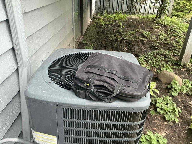 Responded to no cooling complaint and found system flat with no refrigerant charge. Evaluated existing Carrier furnace/air handler and outdoor condenser unit for homeowner preparing to sell property. Provided replacement options and estimate for new HVAC system installation, as current equipment requires significant repair and refrigerant recharge to restore cooling function.