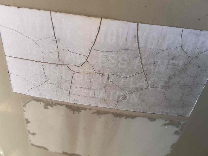 Conducted comprehensive assessment of existing HVAC system for equipment replacement estimate. Documented interior conditions revealing significant moisture-related damage to ceiling and wall surfaces, including extensive cracking patterns on ceiling and paint deterioration on adjacent walls. Photographed deteriorated areas showing discoloration, staining, and structural concerns that will require consideration during replacement installation planning. Transferred detailed estimate information to customer file for review and approval of recommended system replacement.