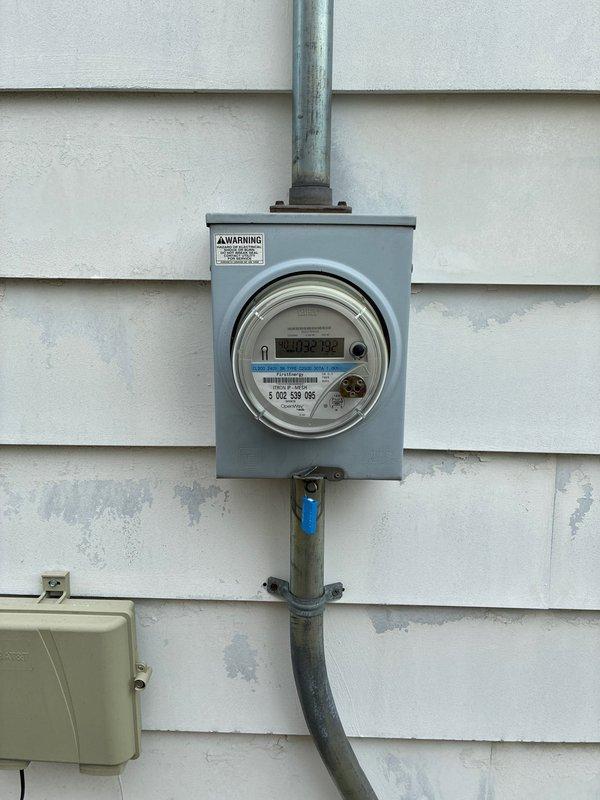 Completed HVAC estimate for adding air conditioning system to existing forced air heating infrastructure. Presented three-tier equipment options featuring varying SEER efficiency ratings: standard 13.4 SEER unit, mid-tier 14 SEER system, and premium 16 SEER configuration, all including matching evaporator coils. Assessed existing ductwork compatibility, electrical service capacity at meter location, and photographically documented current mechanical installation conditions in preparation for AC system integration.