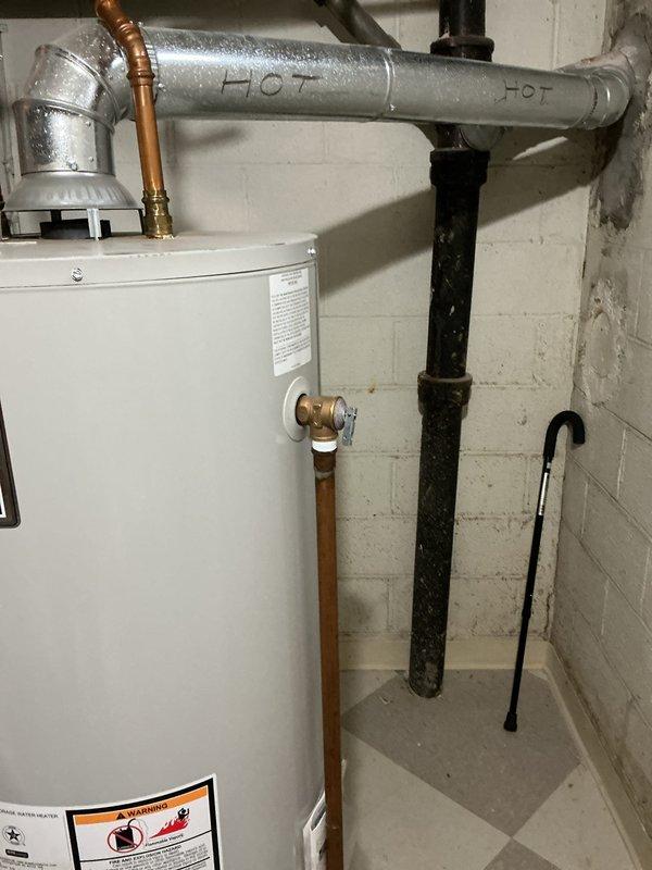 Performed routine maintenance flush on Bradford White tanked water heater unit. Drained sediment buildup from tank bottom, cleared mineral deposits, and verified proper operation of temperature-pressure relief valve. Inspected all copper and galvanized piping connections, shut-off valves, and fittings for leaks or corrosion—all found secure and functioning properly. System refilled, tested, and returned to normal operation.