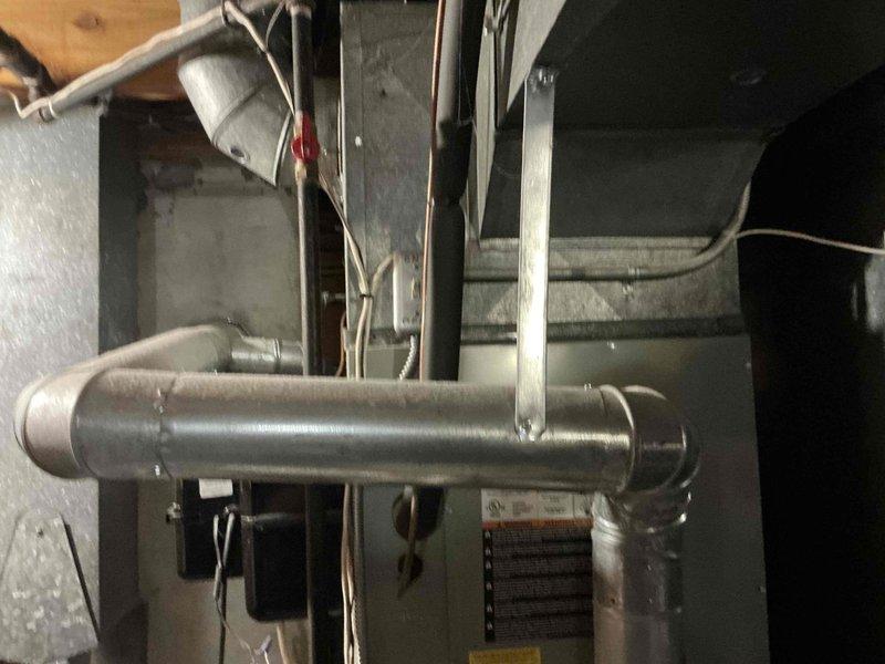 Conducted comprehensive evaluation of existing HVAC system for full replacement options. Assessed indoor furnace unit and ductwork configuration in mechanical space, documenting current equipment condition and specifications. Evaluated exterior electrical disconnect and refrigerant line set connections at outdoor unit location to determine complete system replacement requirements and provide customer with appropriate equipment upgrade options.