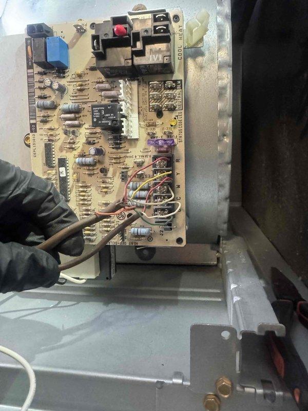 Returned to property to complete repair by replacing failed control board on HVAC system. Installed new circuit board assembly with all electrical connections properly terminated and verified. Added surge protection device to system to prevent future electrical damage from power fluctuations. Performed complete air conditioning maintenance including filter inspection, blower motor check, electrical connections inspection, and system operational verification. All components tested and confirmed functioning properly upon completion.