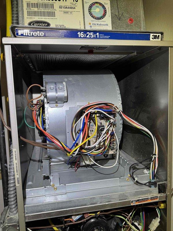 Returned to property to complete repair by replacing failed control board on HVAC system. Installed new circuit board assembly with all electrical connections properly terminated and verified. Added surge protection device to system to prevent future electrical damage from power fluctuations. Performed complete air conditioning maintenance including filter inspection, blower motor check, electrical connections inspection, and system operational verification. All components tested and confirmed functioning properly upon completion.