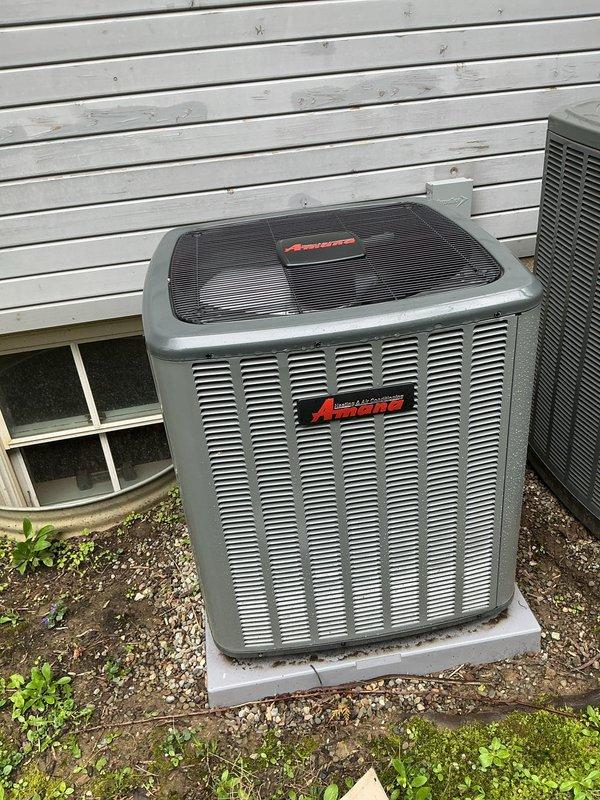 Responded to no cooling call for two residential AC units that simultaneously stopped operating. Found both thermostats placed on hold mode at 70°F setpoint while indoor temperature had risen to 74°F. Cleared hold settings on both thermostats, restoring normal cooling operation to the 2-month-old and 2-year-old systems.
