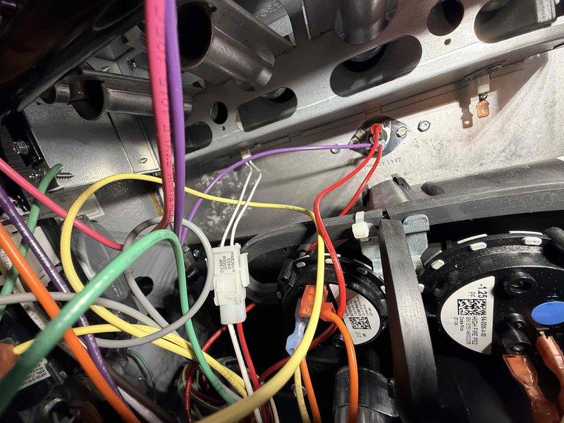 Completed first-year heating system maintenance on residential HVAC unit. Performed comprehensive inspection of internal components including heat exchanger, blower assembly, electrical connections, and motor operations. Noted dust and debris accumulation on return air grille and surrounding areas, which is typical for systems in regular use. Verified all wire connections were secure, examined heat exchanger for proper condition, and confirmed blower motors were functioning within normal parameters. System is operating as designed with all components in acceptable working order.