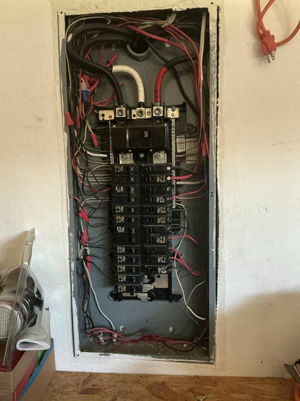 Performed comprehensive electrical inspection of residential property. Conducted thorough examination of main electrical panel, verifying proper circuit breaker installation, wire connections, and panel configuration. Inspected water heater area including associated electrical components, gas piping, copper water lines, and exhaust flue system. Documented all findings with photographs for record-keeping purposes. All systems observed and inspection completed without identifying immediate safety concerns requiring corrective action.