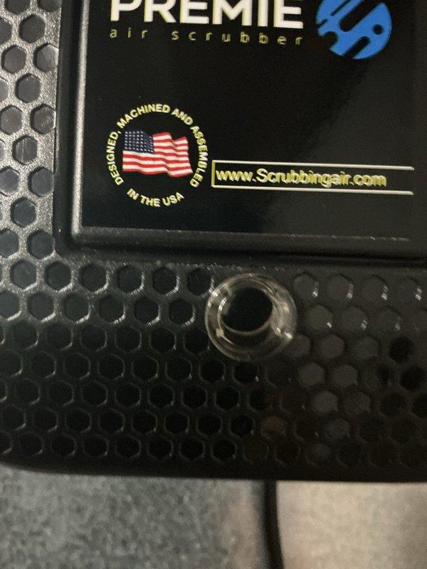Completed routine cooling system maintenance inspection. Examined and documented air filtration components including honeycomb-pattern air filter and Premier air scrubber unit with integrated HVAC air quality system. All components found in serviceable condition with proper installation and operation confirmed.