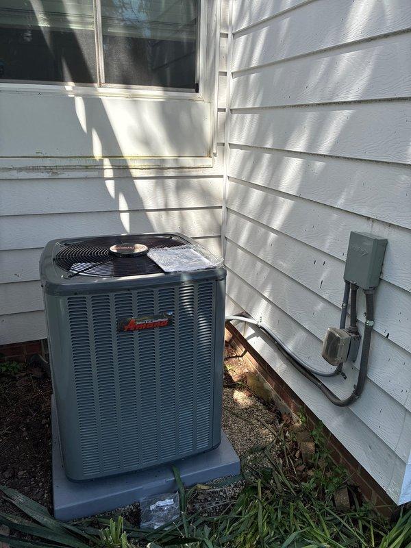 Completed full HVAC system installation including 96% efficiency furnace, air conditioning unit, and humidifier. Installed Amana outdoor condensing unit on concrete pad with proper electrical disconnect and conduit routing, established all refrigerant line connections, and verified system operation at manufacturer specifications.